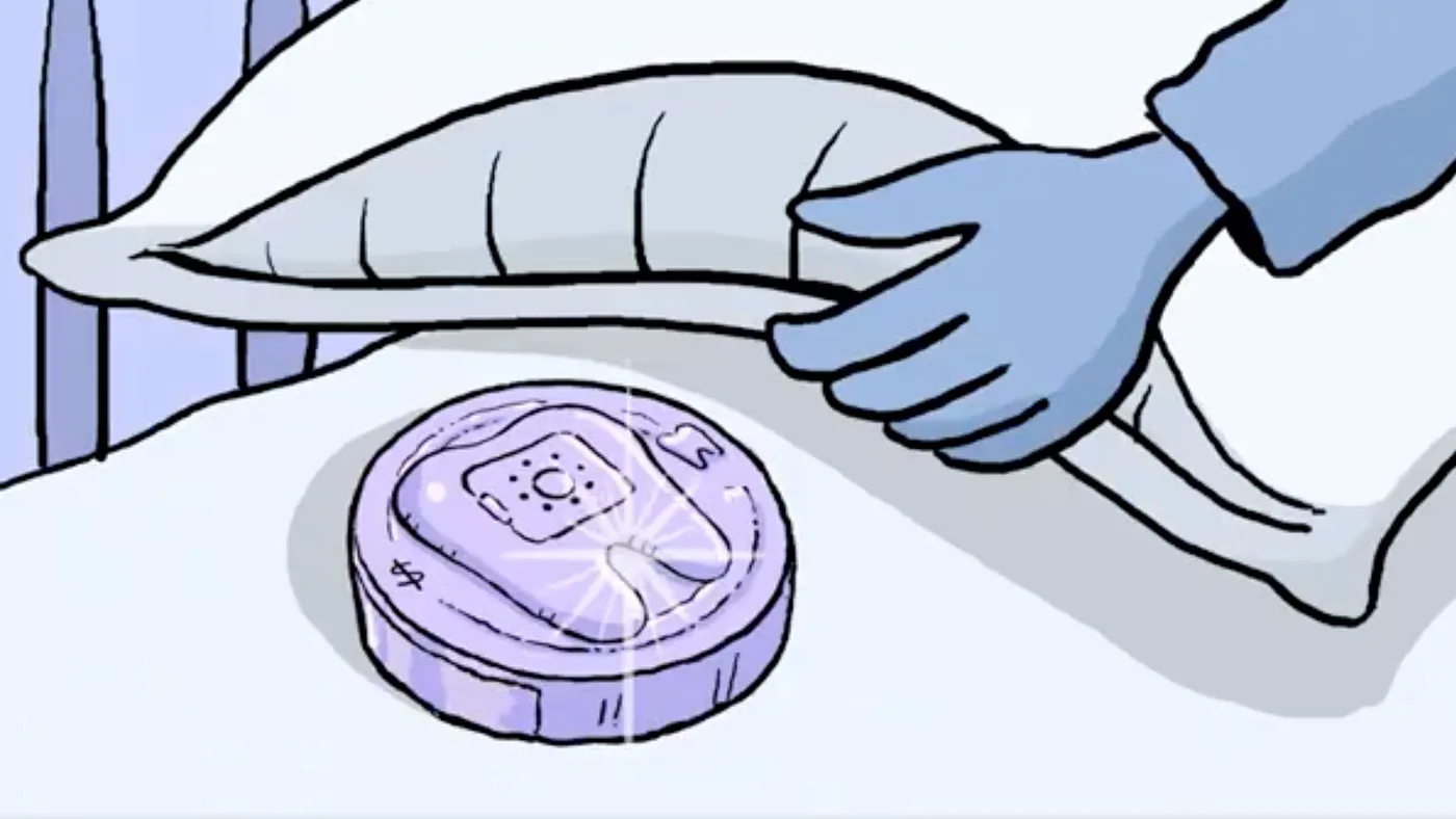 A hand lifting a pillow to reveal the ToothSafe waiting underneath, where a tooth fairy pillow would usually sit